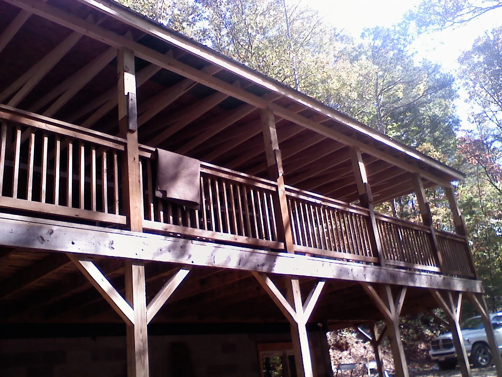 Timber framing under a new elevated porch and deck — Roof Leak Repair in Roy by Roofing Brothers
